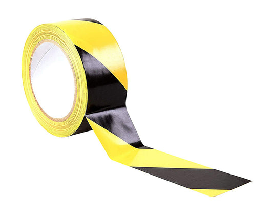 A roll of adhesive hazard warning tape with yellow and black stripes.